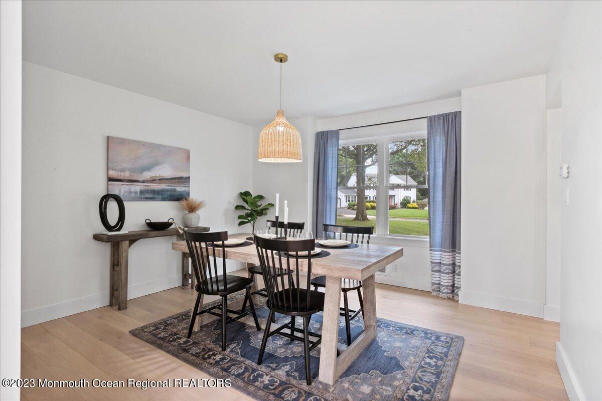 17 Quaker Road Middletown, NJ 07748 - Photo 10 of 65 a view of a dining room with furniture window and outside view