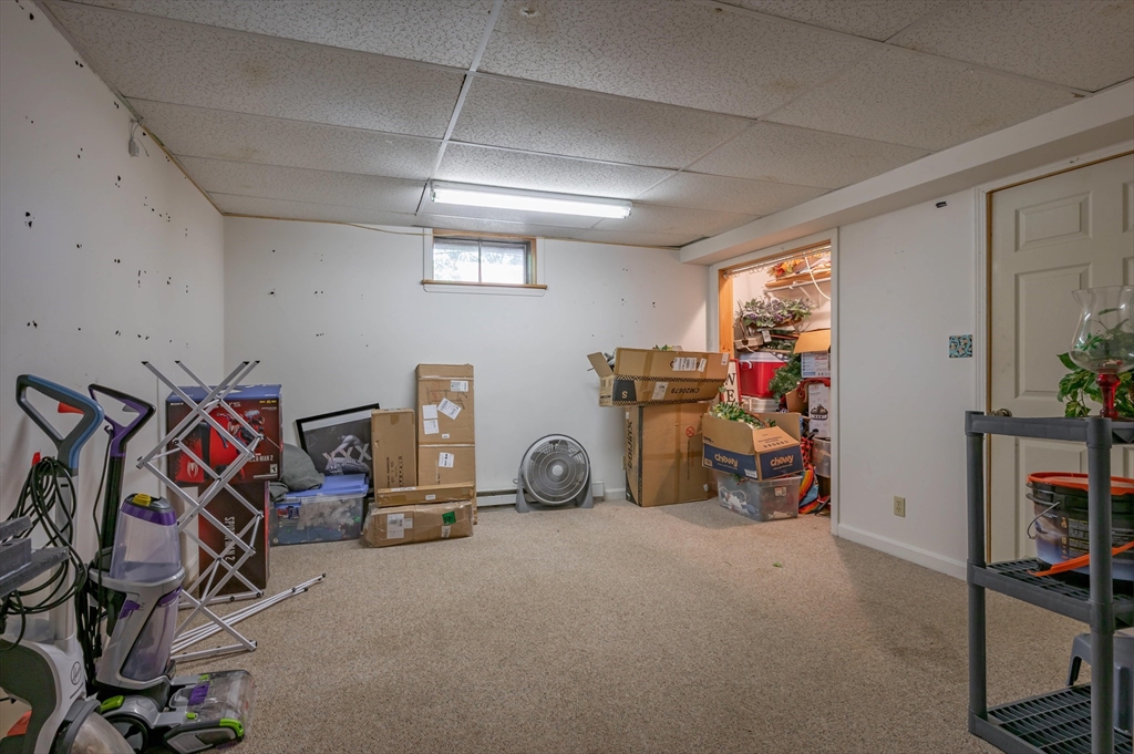 11 Shawnee Road Pepperell, MA 01463 - Photo 11 of 22 a view of a room with gym equipment
