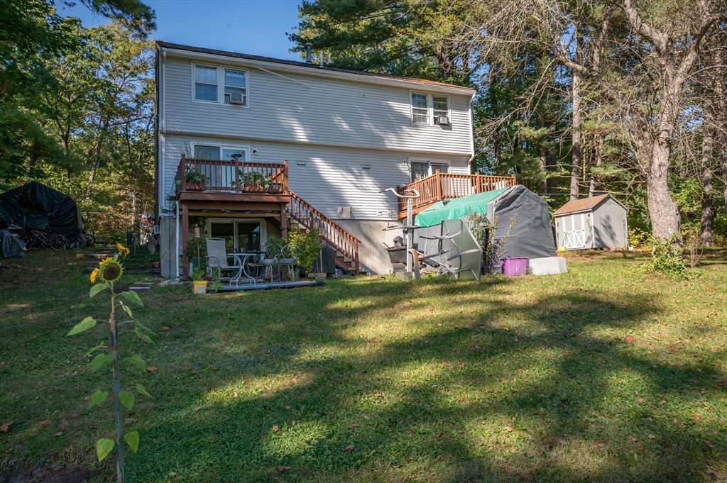 11 Shawnee Road Pepperell, MA 01463 - Photo 22 of 22 a view of a house with a yard