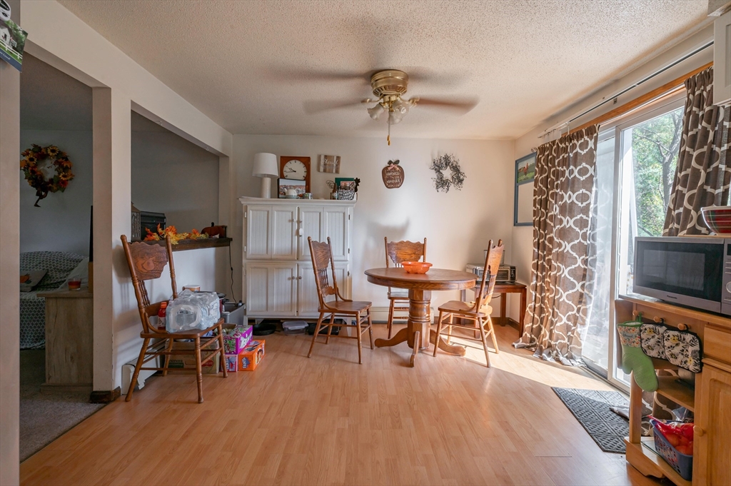 11 Shawnee Road Pepperell, MA 01463 - Photo 6 of 22 a living room with furniture and a flat screen tv