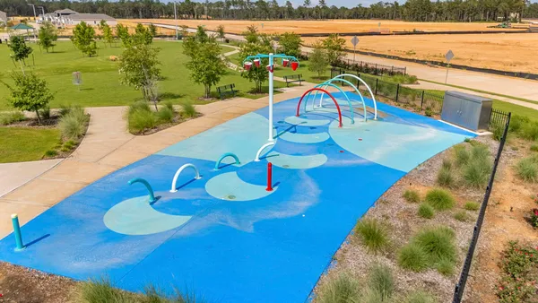 a view of a swimming pool with a patio