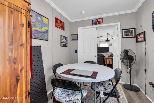 a view of a dining room with furniture