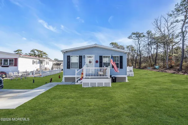 front view of house that has a yard