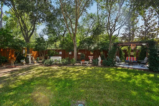 a view of a trees in front of a house