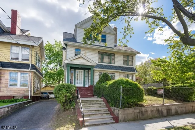 a view of a house with a garden