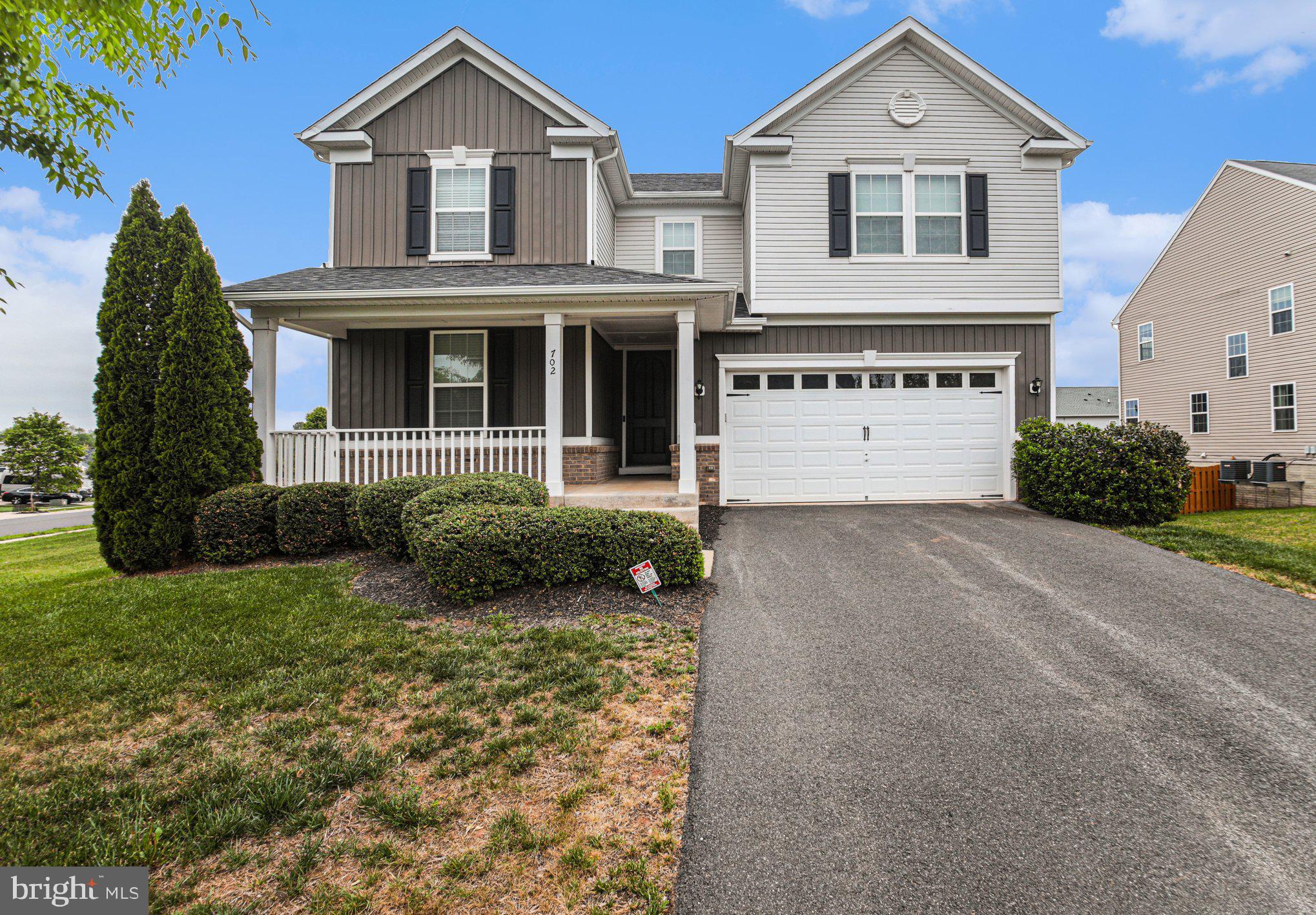 702 Kingsbrook Road Culpeper, VA 22701 - Photo 2 of 35 a front view of a house with a yard