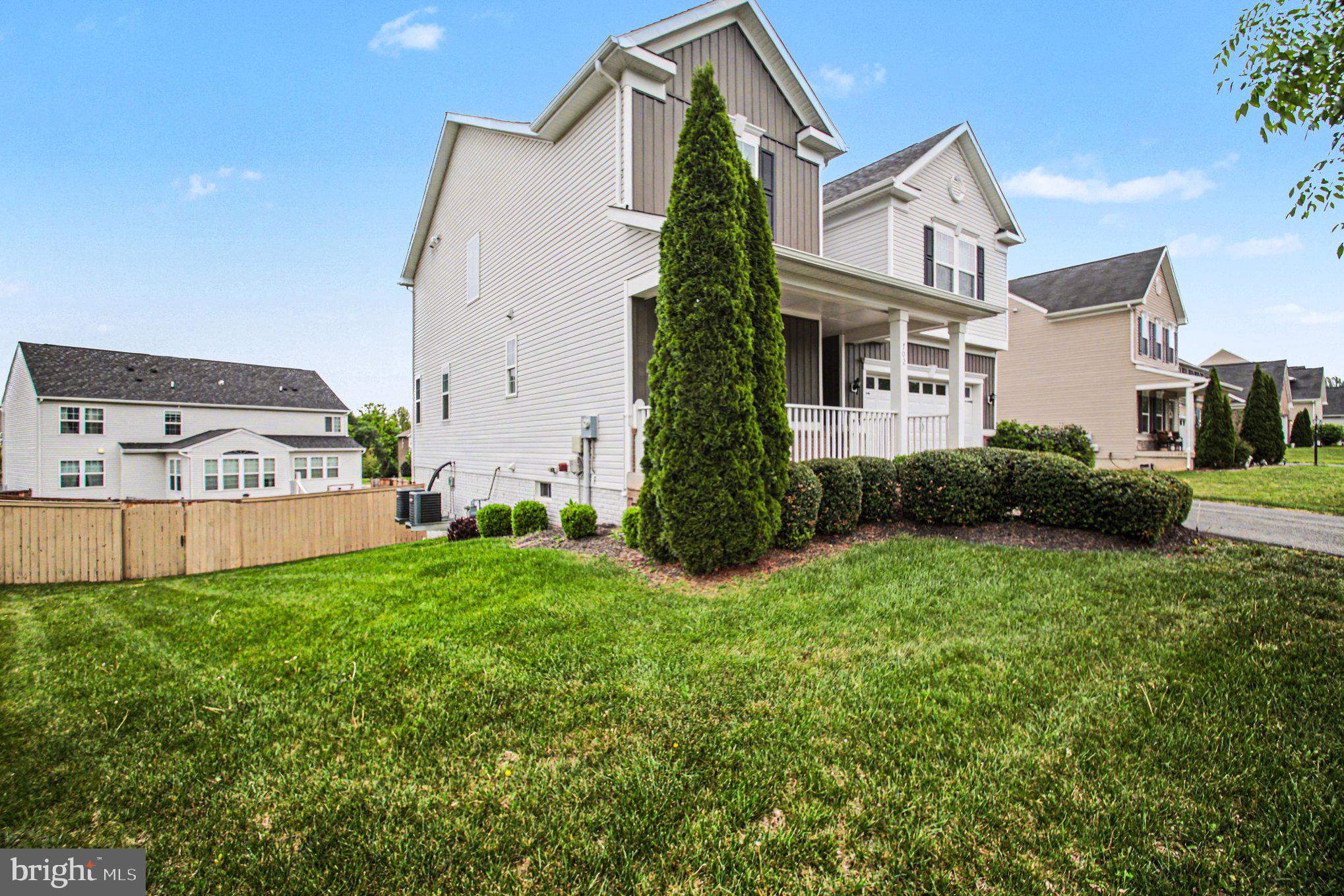702 Kingsbrook Road Culpeper, VA 22701 - Photo 5 of 35 a view of a house with backyard and garden