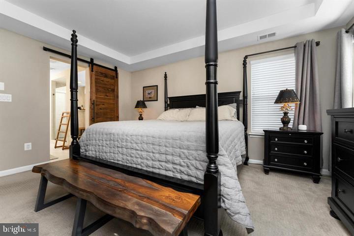 702 Kingsbrook Road Culpeper, VA 22701 - Photo 10 of 35 a bedroom with a bed window and a balcony