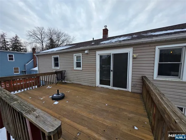 a backyard of a house with seating space