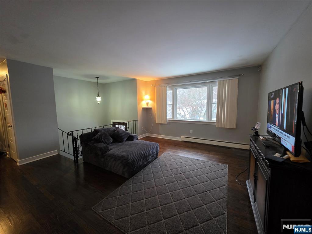 12 Augusta Street Denville, NJ 07834 - Photo 3 of 24 a living room with furniture and a flat screen tv