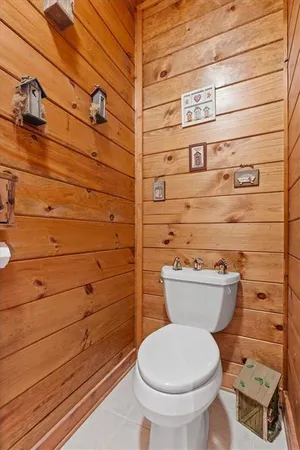 a bedroom with bed and window