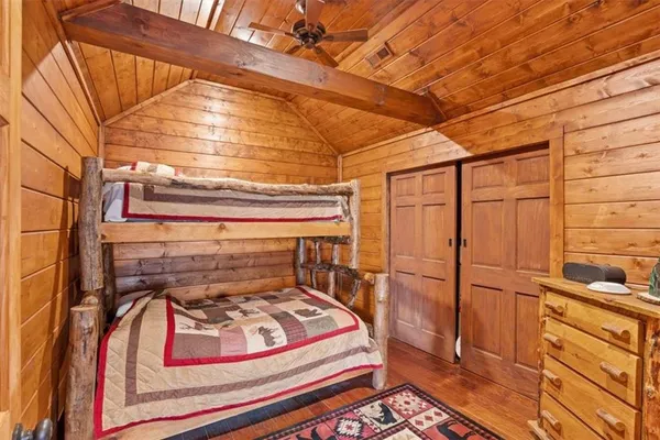 a view of a balcony with an outdoor seating