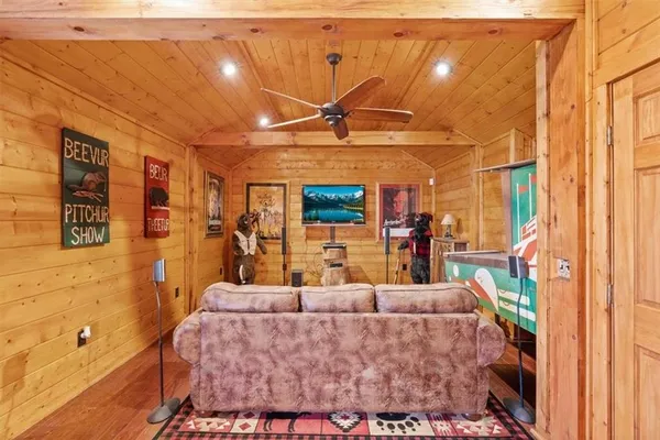a bathroom with a sink a toilet and shower curtain
