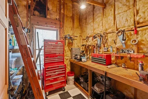 a view of porch with wooden floor