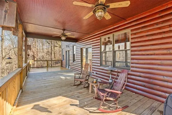 a view of a chairs and table in a patio