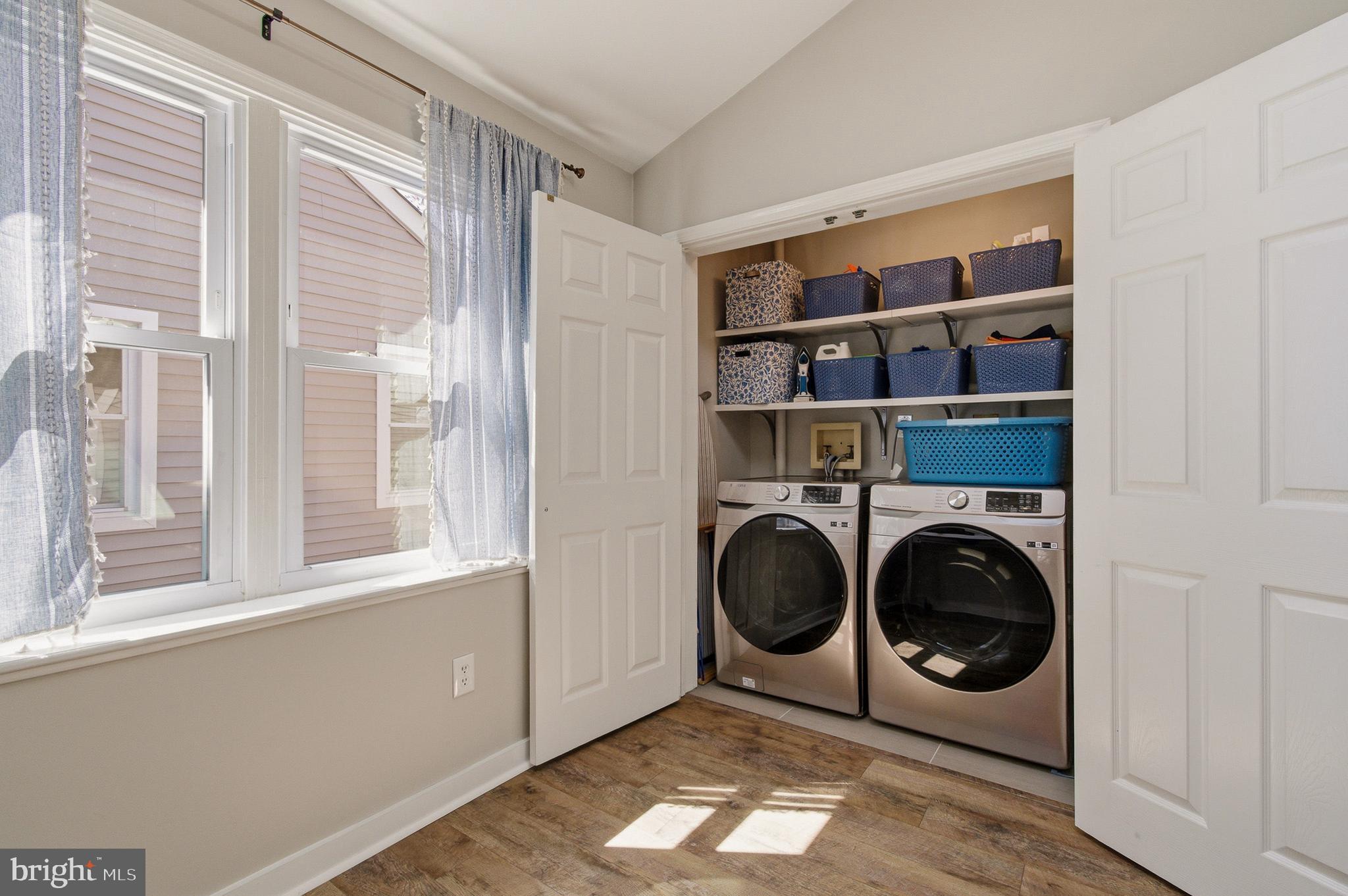 1410 Knights Bridge Turn Crofton, MD 21114 - Photo 15 of 75 a view of a bedroom with washer and dryer