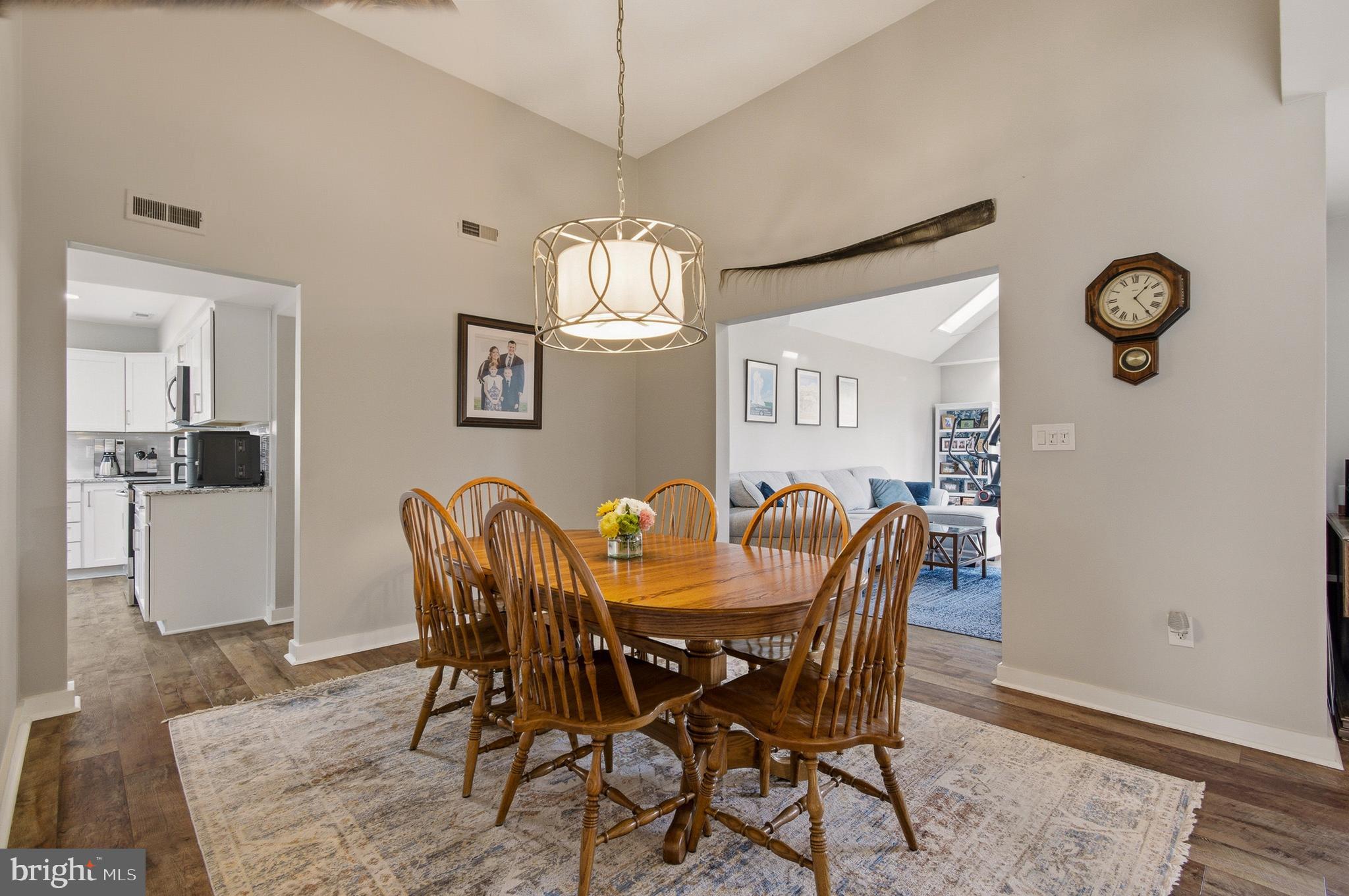 1410 Knights Bridge Turn Crofton, MD 21114 - Photo 16 of 75 a view of a dining room with furniture and wooden floor