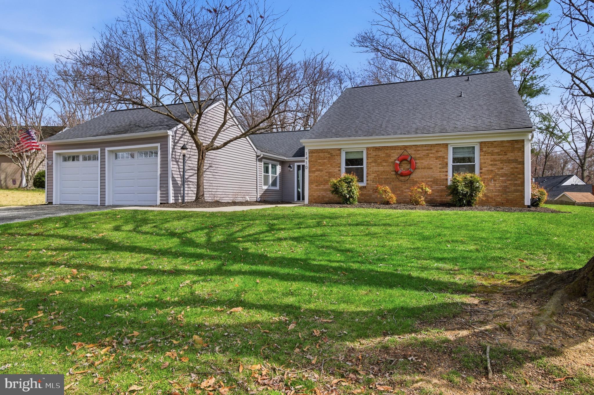 1410 Knights Bridge Turn Crofton, MD 21114 - Photo 2 of 75 a view of a house with a yard