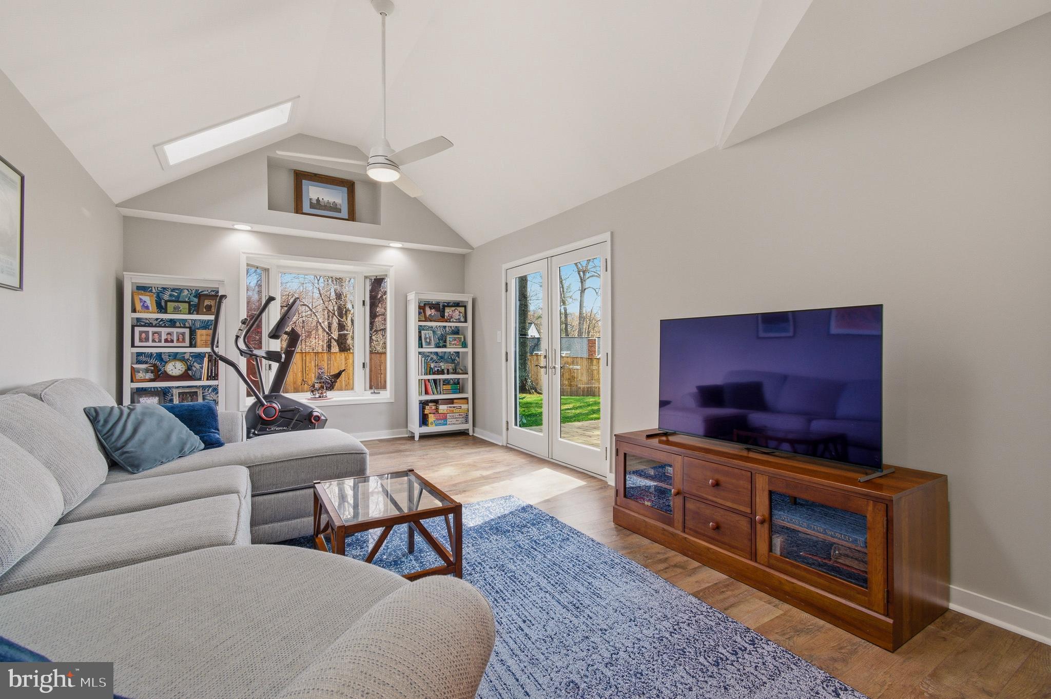 1410 Knights Bridge Turn Crofton, MD 21114 - Photo 21 of 75 a living room with furniture and a flat screen tv