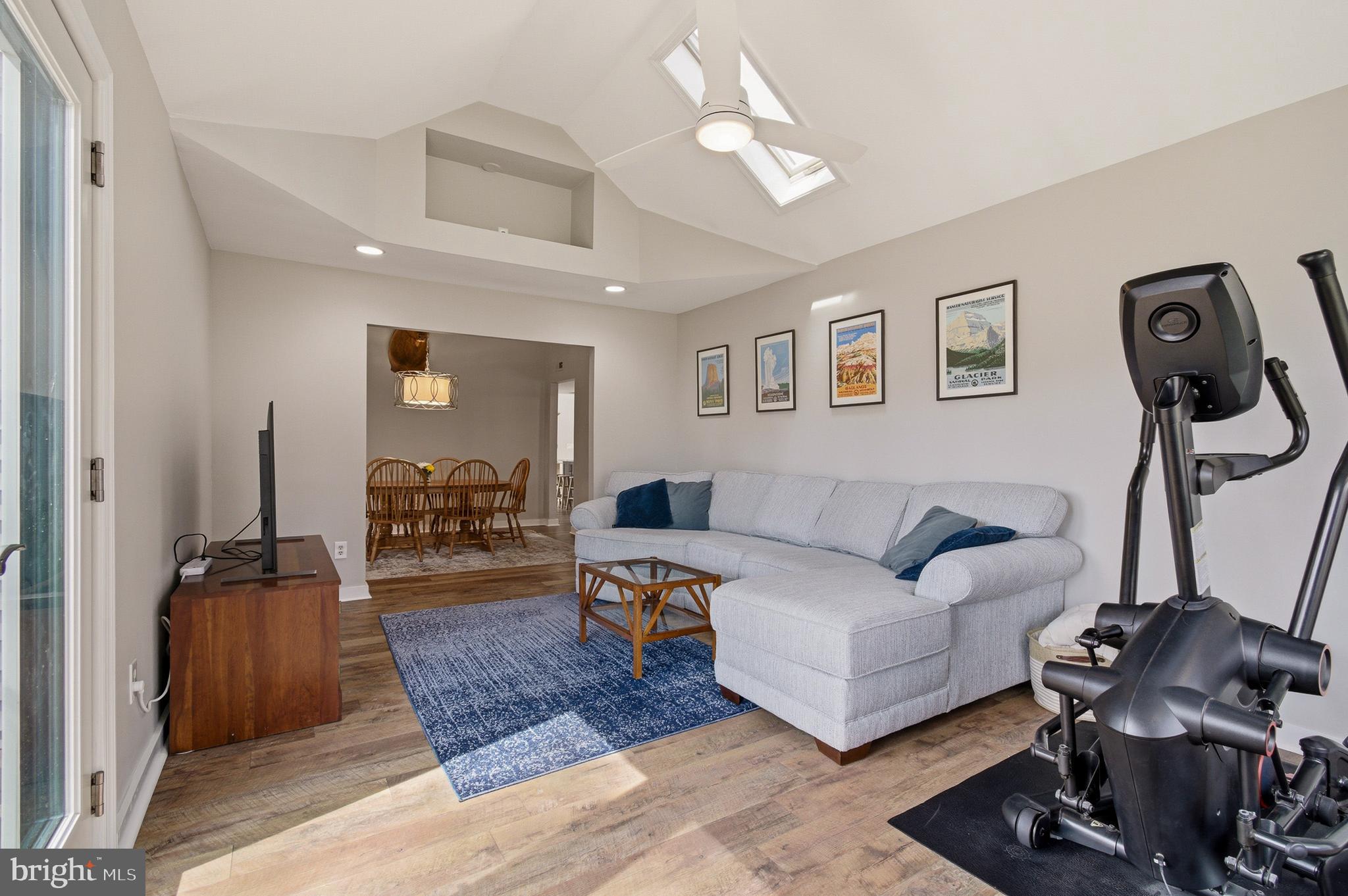 1410 Knights Bridge Turn Crofton, MD 21114 - Photo 22 of 75 a living room with furniture and a mirror