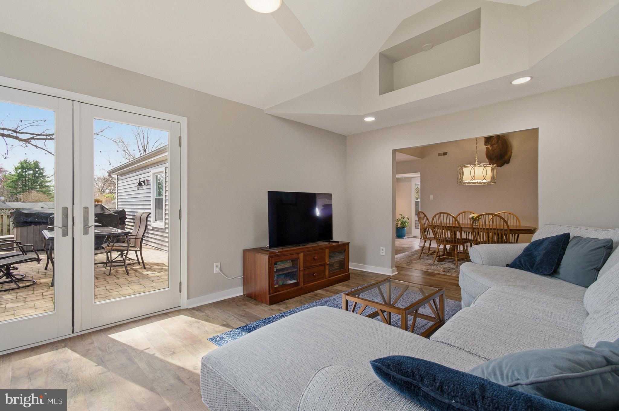 1410 Knights Bridge Turn Crofton, MD 21114 - Photo 23 of 75 a living room with furniture and a flat screen tv