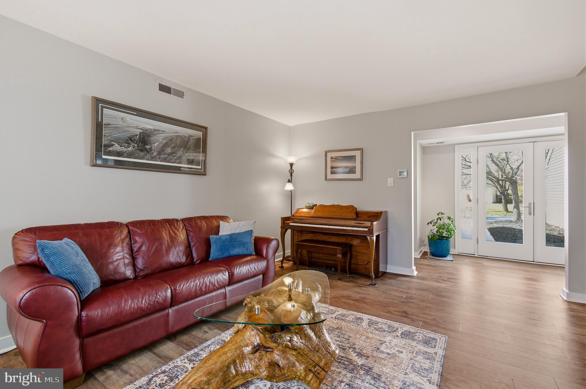 1410 Knights Bridge Turn Crofton, MD 21114 - Photo 26 of 75 a living room with furniture and wooden floor