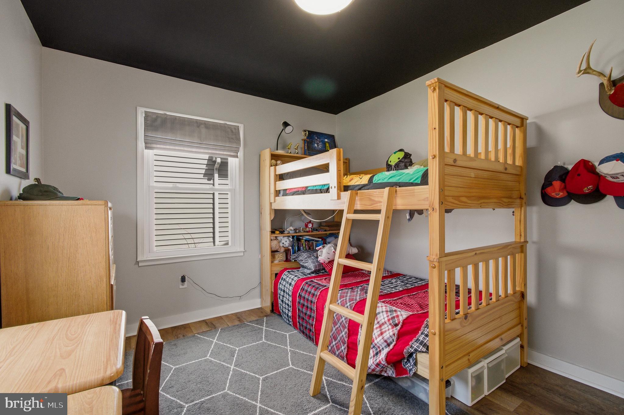 1410 Knights Bridge Turn Crofton, MD 21114 - Photo 39 of 75 a bedroom with a bed and a window