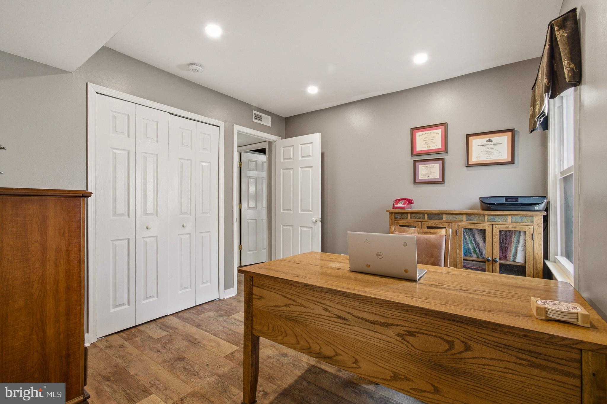 1410 Knights Bridge Turn Crofton, MD 21114 - Photo 42 of 75 a bedroom with a bed and furniture