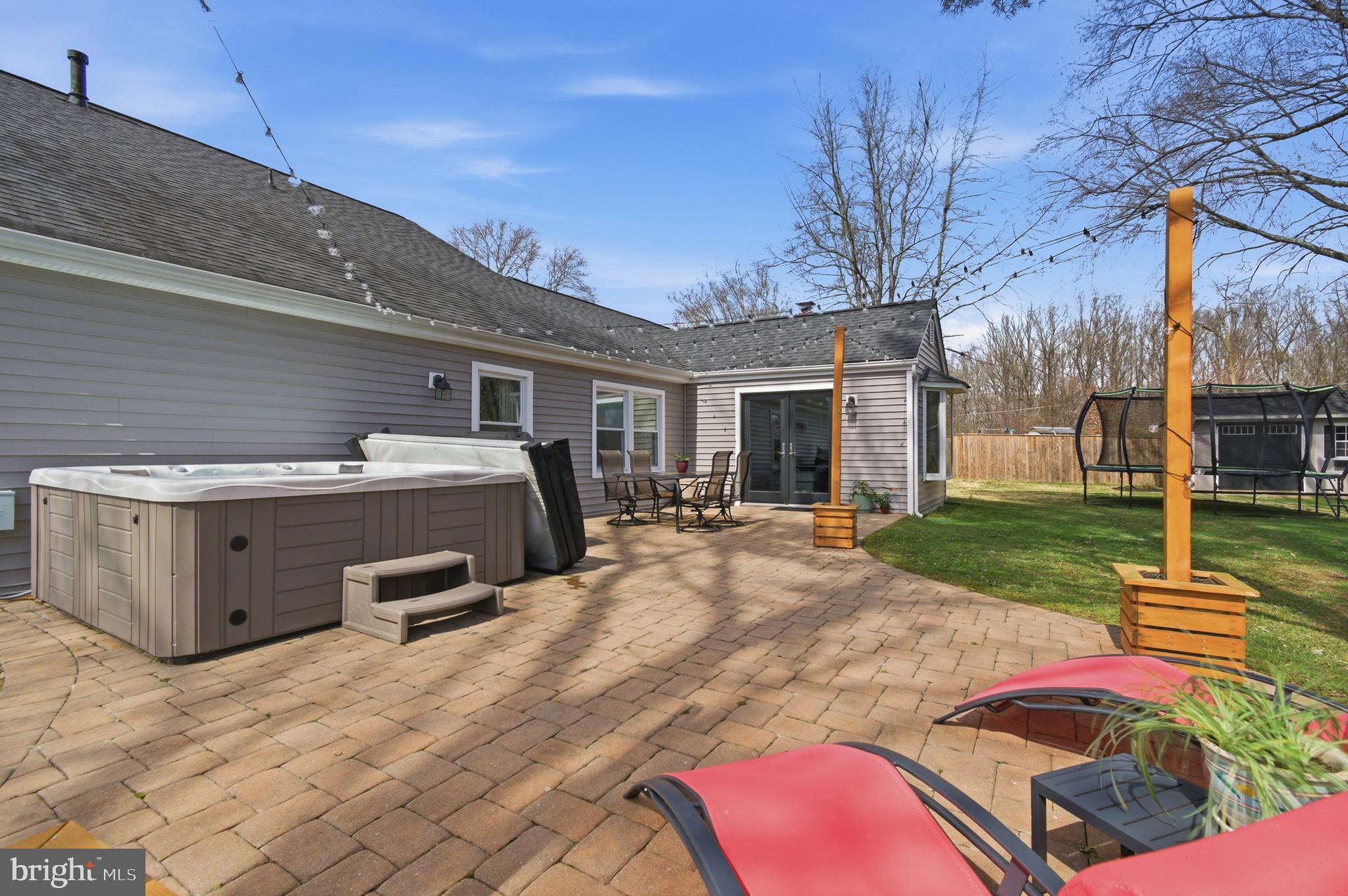 1410 Knights Bridge Turn Crofton, MD 21114 - Photo 47 of 75 a patio with a table and chairs