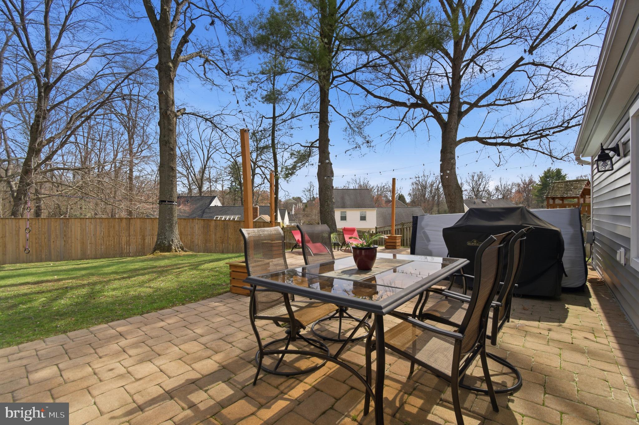 1410 Knights Bridge Turn Crofton, MD 21114 - Photo 49 of 75 a view of a backyard with sitting area