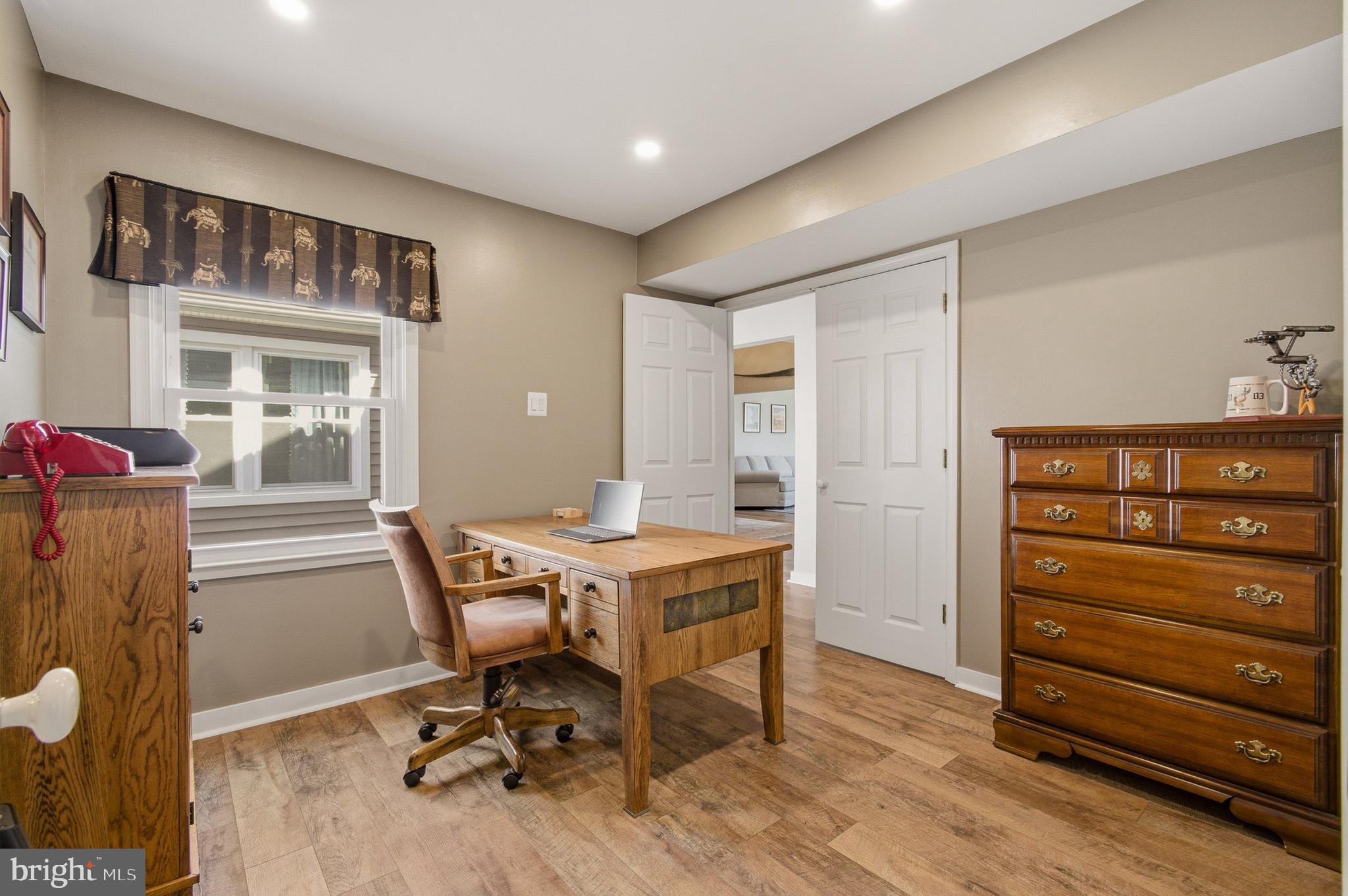 1410 Knights Bridge Turn Crofton, MD 21114 - Photo 50 of 75 a view of a workspace with furniture and a window
