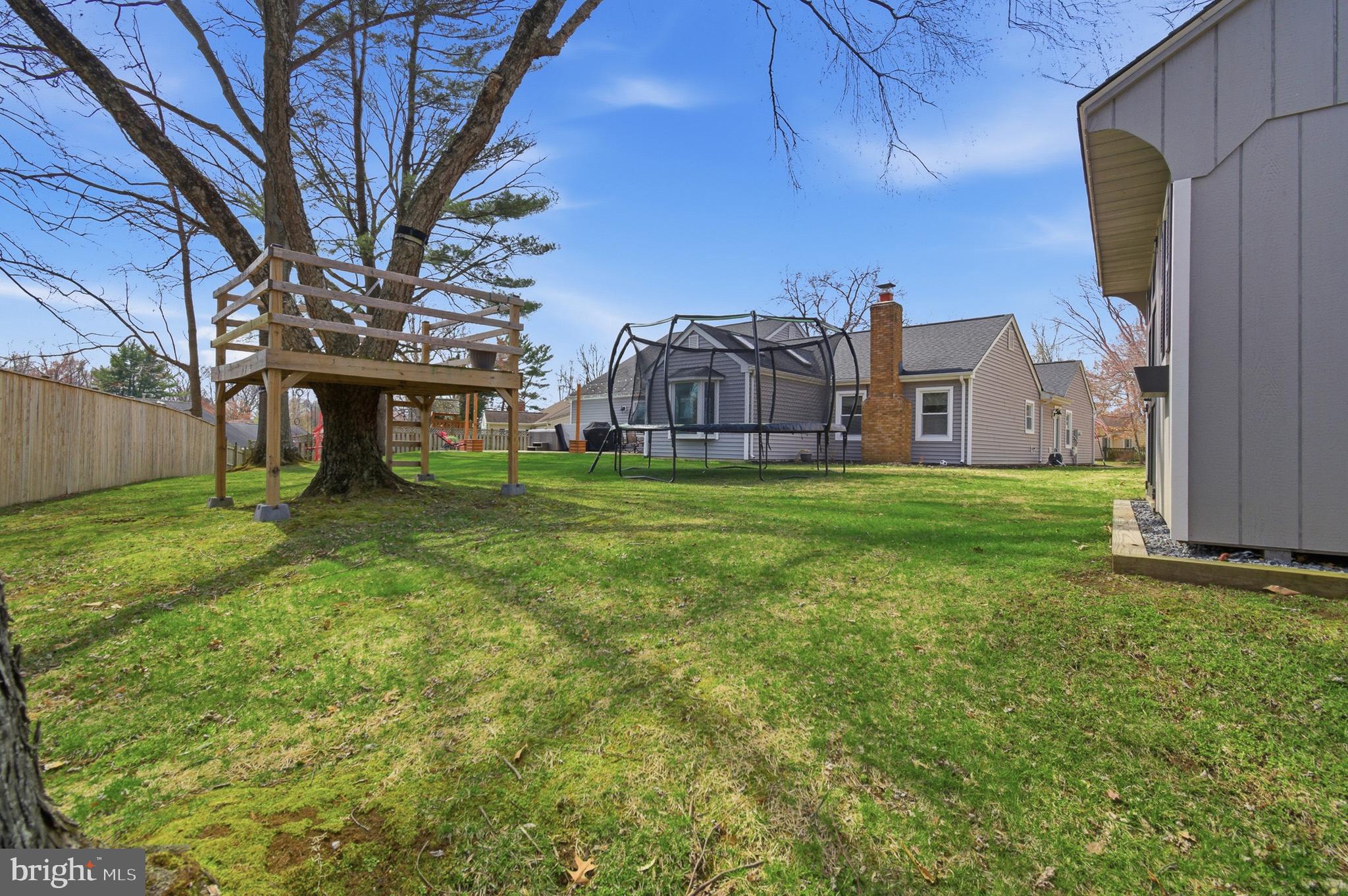 1410 Knights Bridge Turn Crofton, MD 21114 - Photo 53 of 75 a view of a house with a yard and sitting area