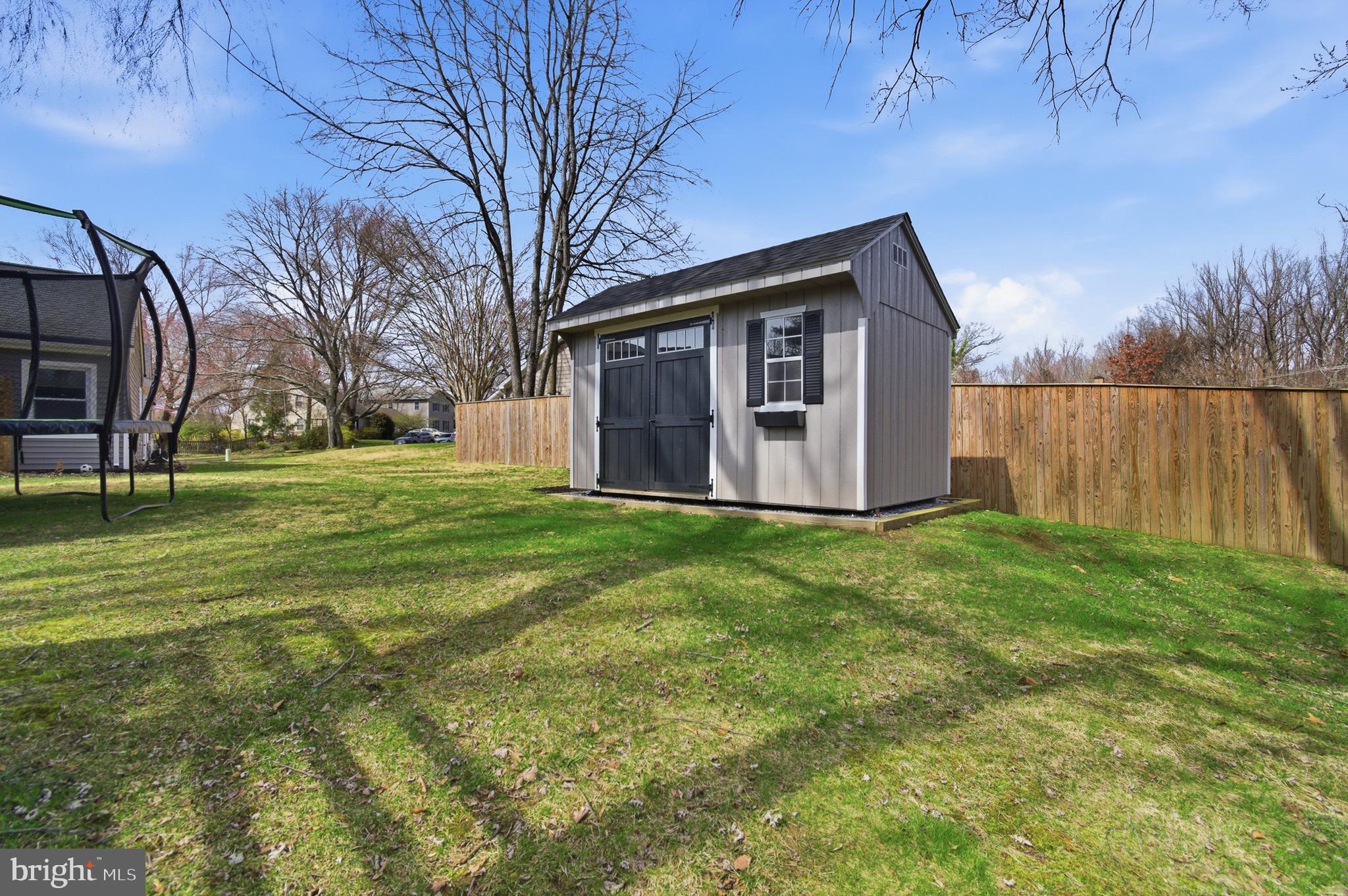 1410 Knights Bridge Turn Crofton, MD 21114 - Photo 54 of 75 a house with garden in front of it