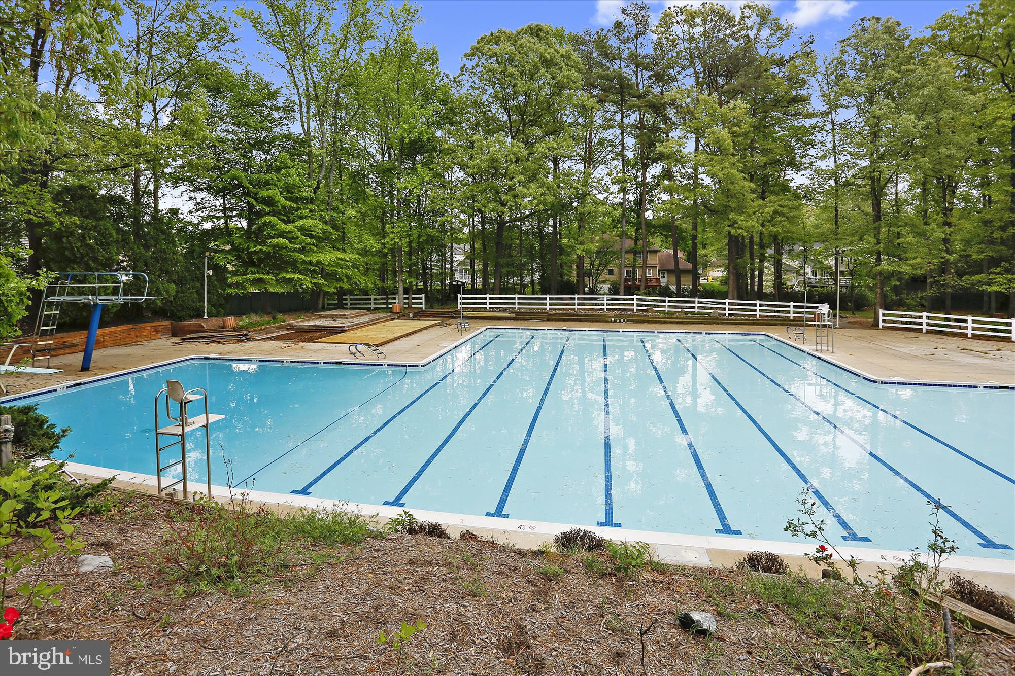 1410 Knights Bridge Turn Crofton, MD 21114 - Photo 68 of 75 a view of a swimming pool with an outdoor space and seating area