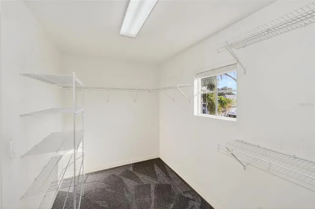 a bathroom with a double vanity sink a mirror and a shower