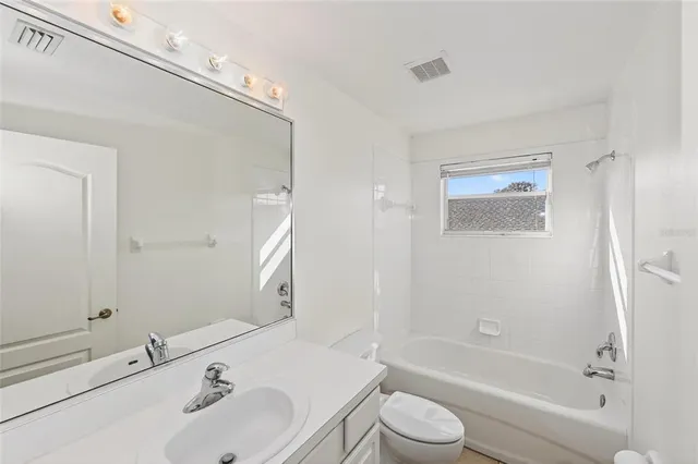 a view of a hallway with entryway