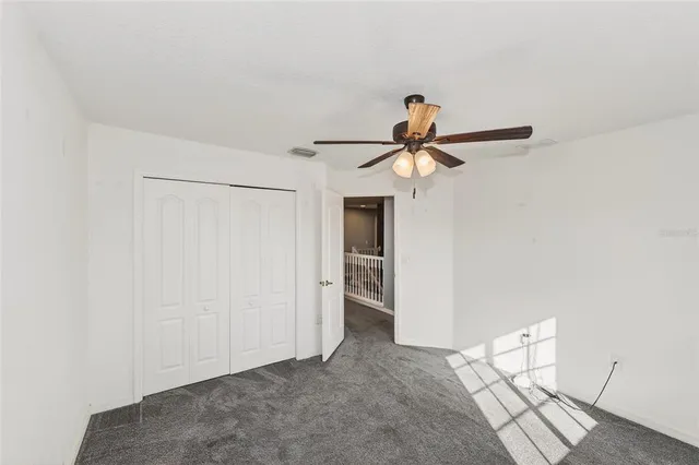 a view of a swimming pool with a porch