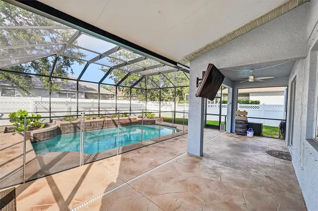 a view of swimming pool with a backyard