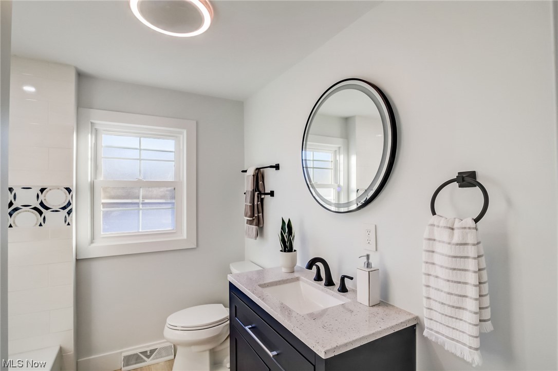 3660 Harvey Road Cleveland, OH 44118 - Photo 17 of 32 Bathroom featuring vanity and toilet