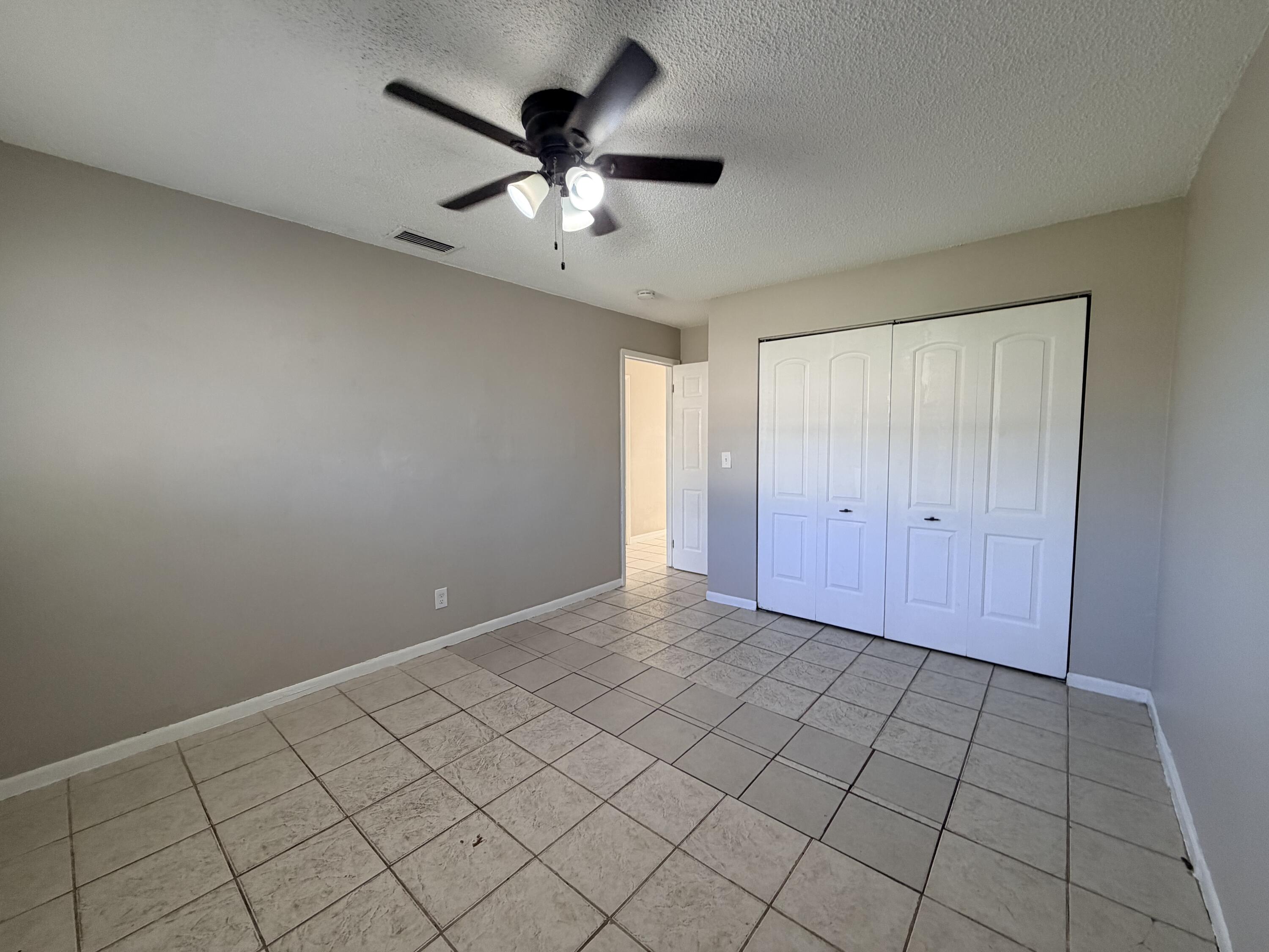 3594 Almar Road, Unit 3 Lake Worth, FL 33461 - Photo 4 of 15 a view of an empty room