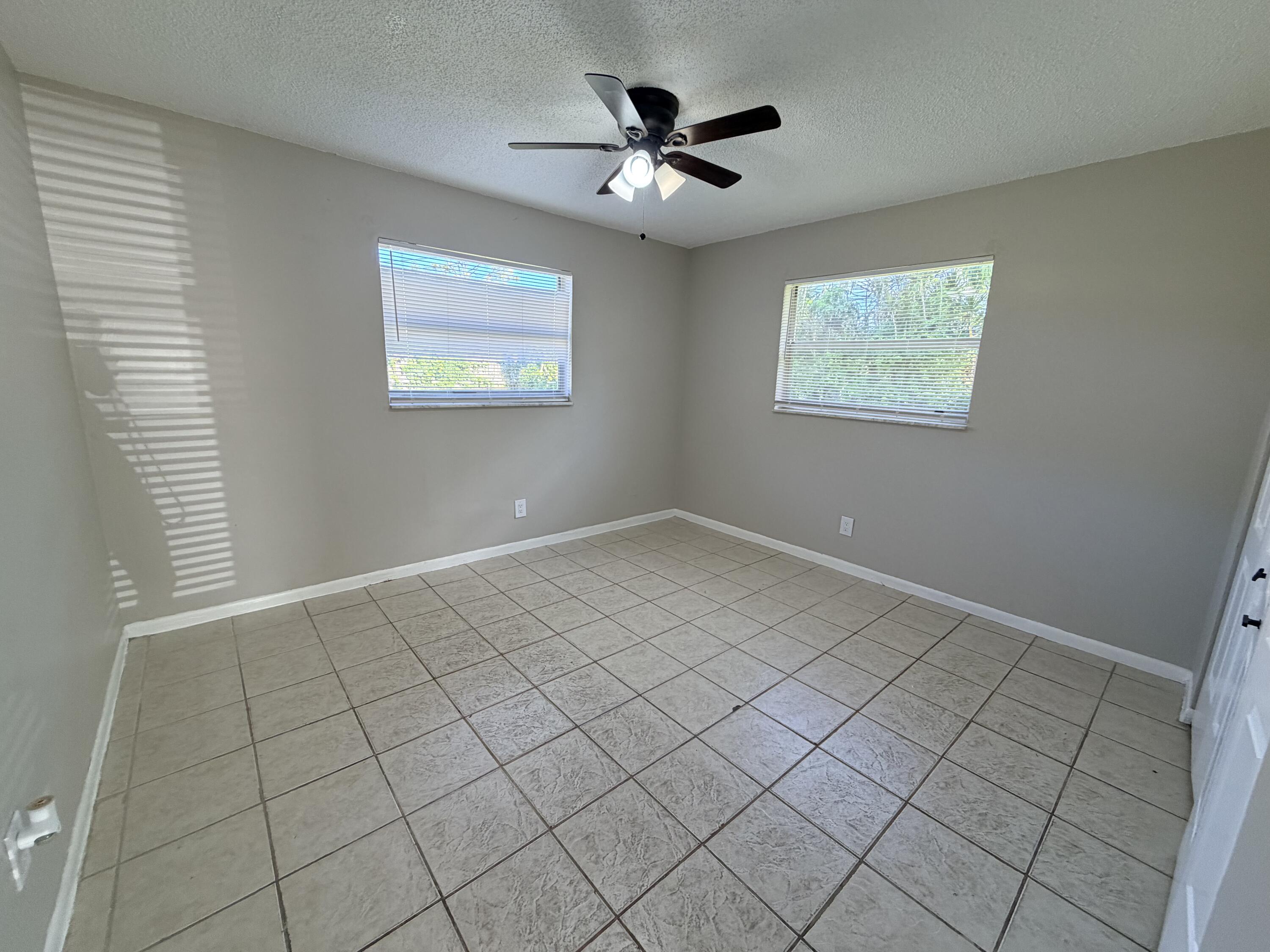 3594 Almar Road, Unit 3 Lake Worth, FL 33461 - Photo 7 of 15 a view of an empty room and a window