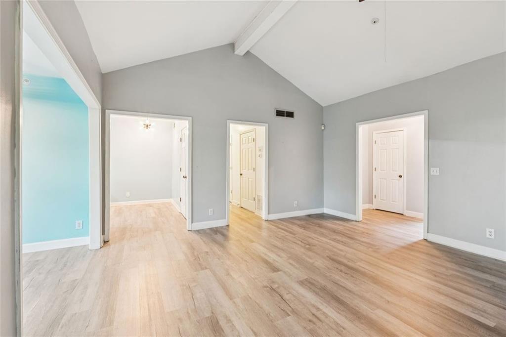 1205 Killarney Southeast Smyrna, GA 30080 - Photo 11 of 58 a view of an empty room with wooden floor