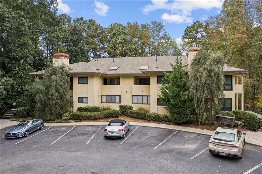 1205 Killarney Southeast Smyrna, GA 30080 - Photo 2 of 58 a car parked in front of a house
