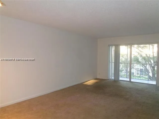 $1,450 | 1075 Riverside Drive, Unit 304, Coral Springs, FL 33071