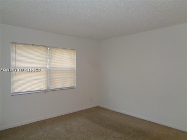 1075 Riverside Drive, Unit 304 Coral Springs, FL 33071 - Photo 7 of 12