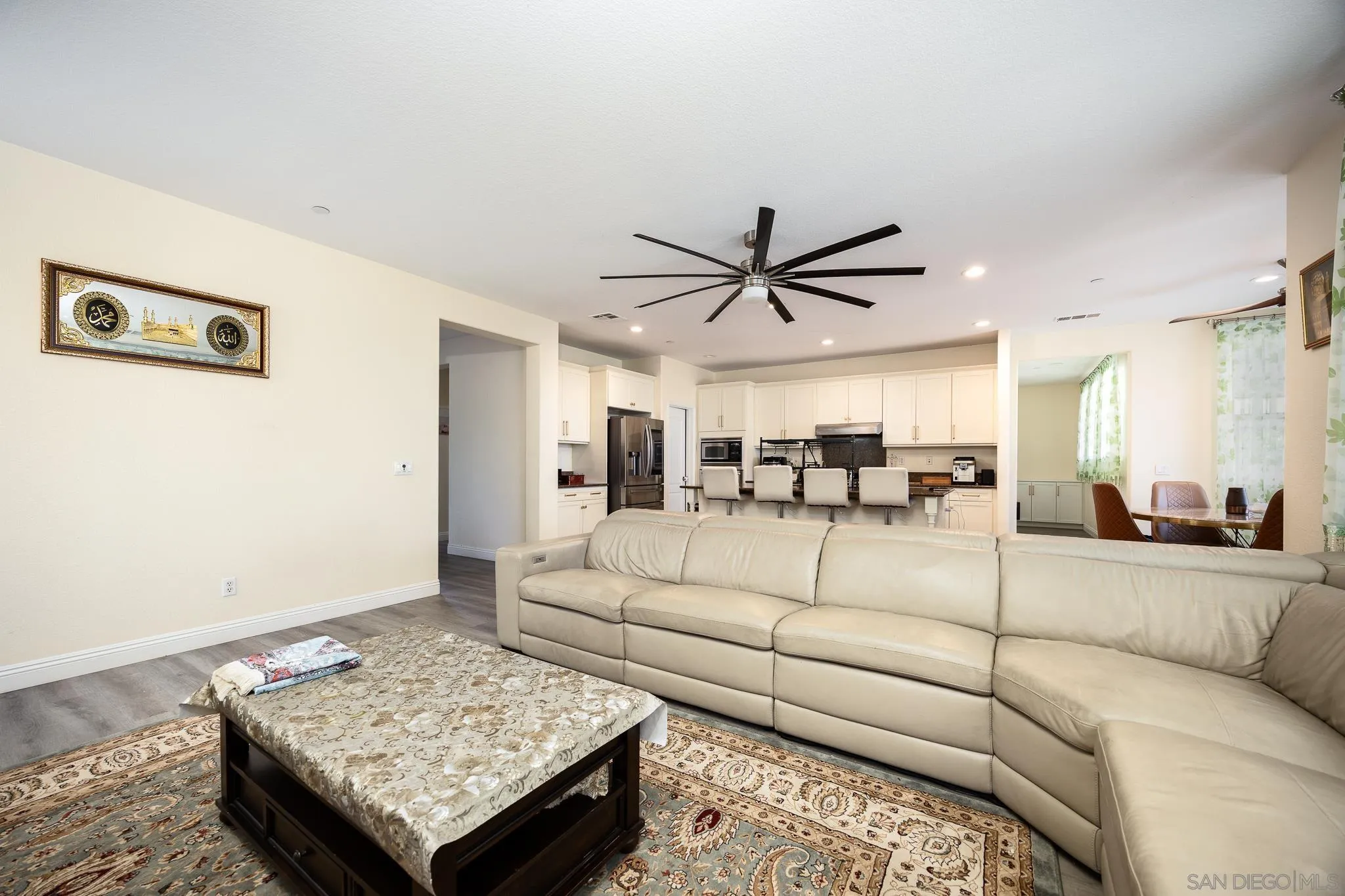 5120 Sevilla Street Santee, CA 92071 - Photo 14 of 44 a living room with furniture and a view of kitchen