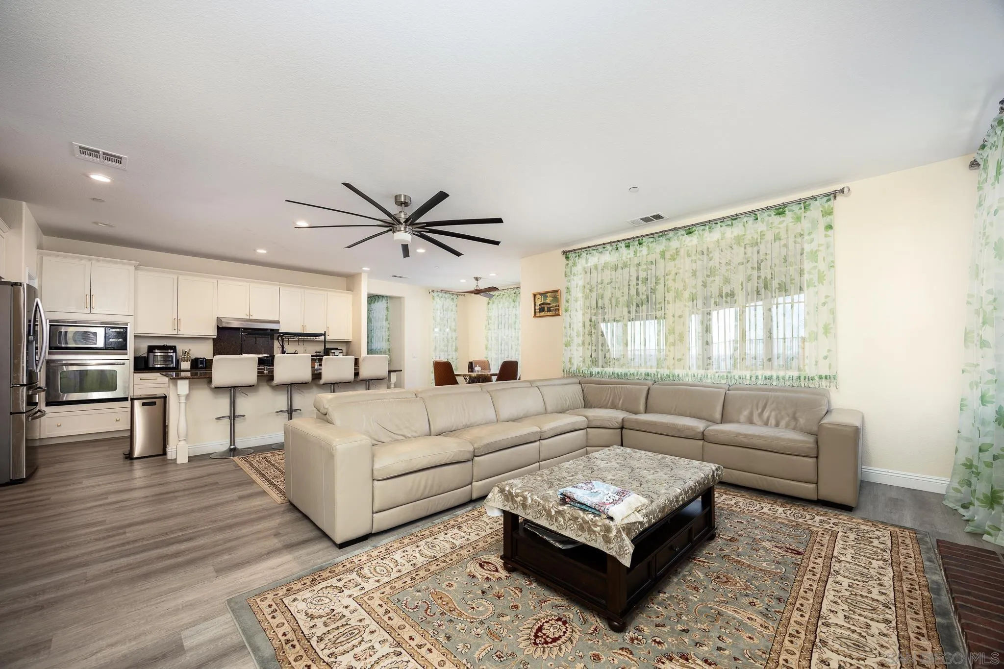 5120 Sevilla Street Santee, CA 92071 - Photo 16 of 44 a living room with furniture and a large window