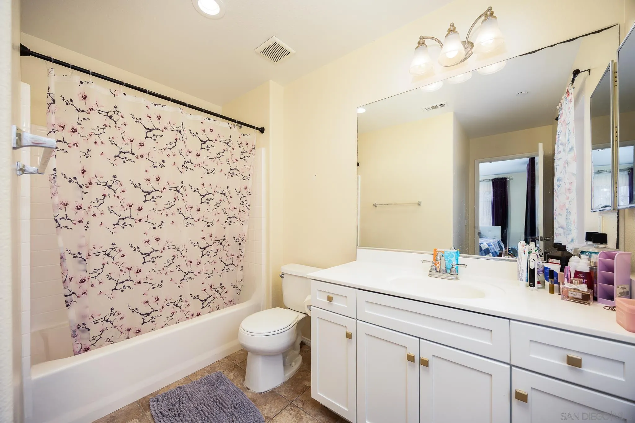 5120 Sevilla Street Santee, CA 92071 - Photo 28 of 44 a bathroom with a sink toilet and shower