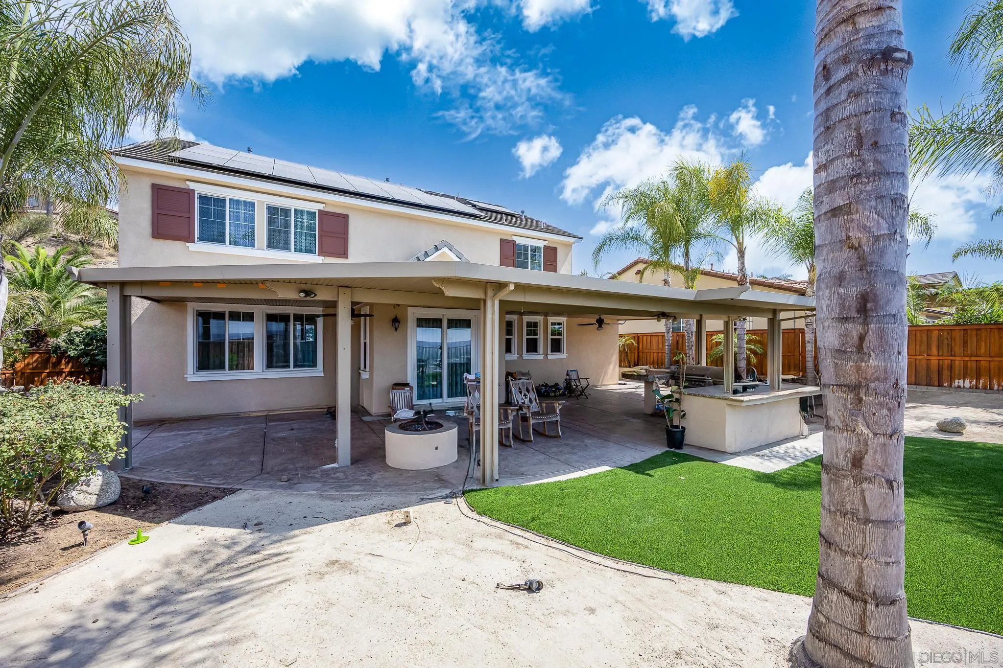 5120 Sevilla Street Santee, CA 92071 - Photo 33 of 44 a front view of a house with sitting area and garden