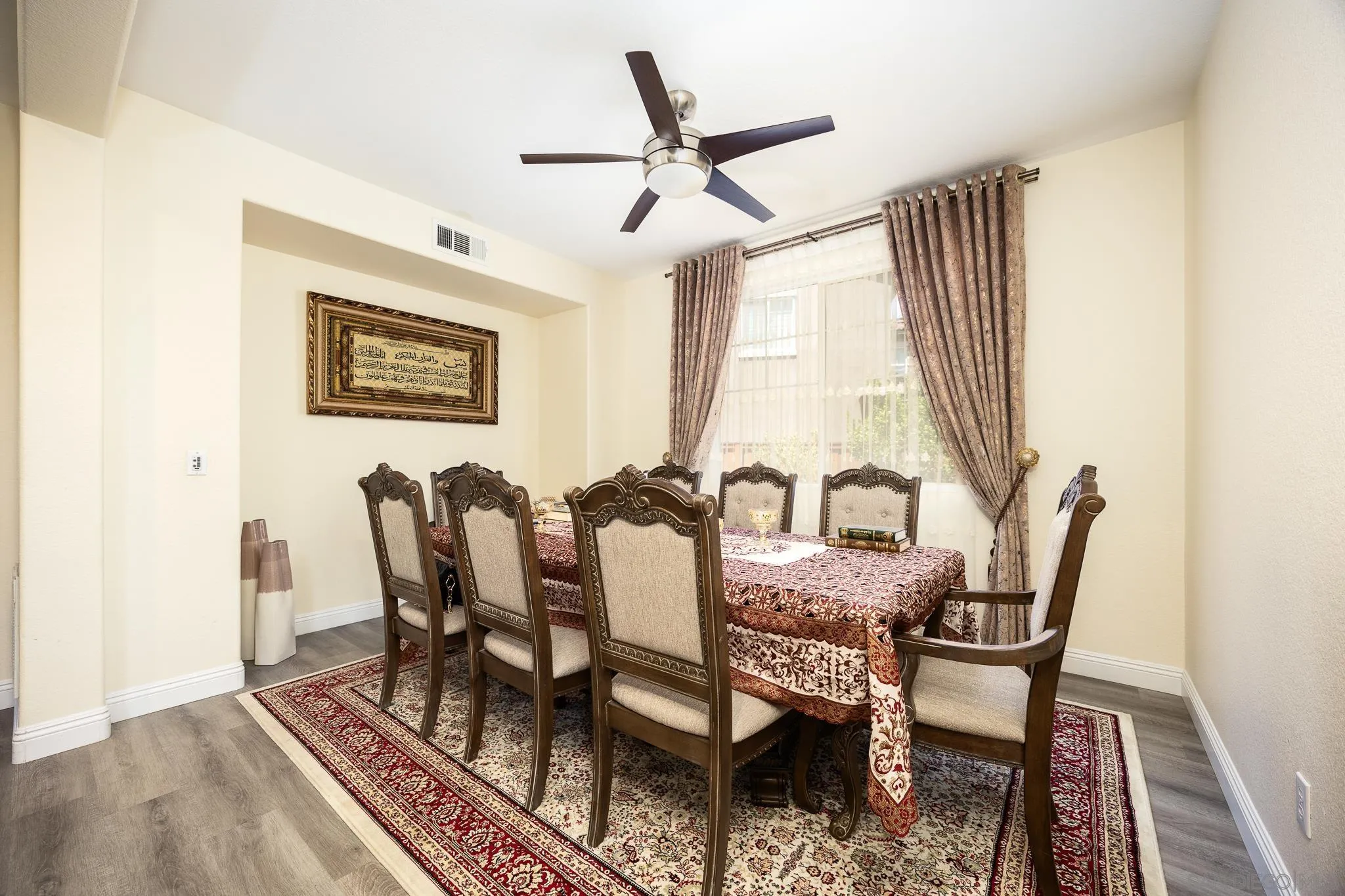 5120 Sevilla Street Santee, CA 92071 - Photo 8 of 44 a view of a dining room with furniture window and wooden floor